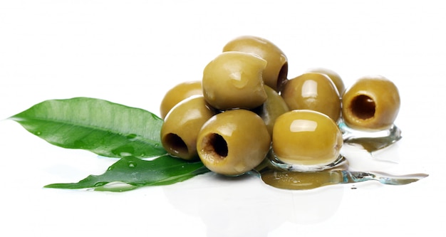 Green olives in oil Free Photo