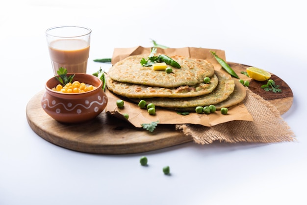 Premium Photo | Green Peas Paratha Or Flatbread Or Matar Parathas With ...