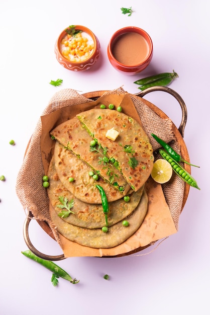 Premium Photo | Green Peas Paratha Or Flatbread Or Matar Parathas With ...