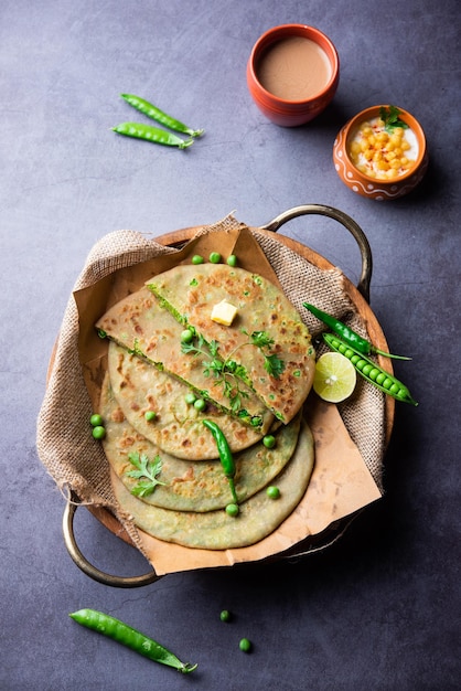 Premium Photo | Green Peas Paratha Or Flatbread Or Matar Parathas With ...