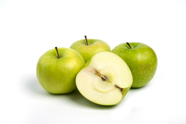 Green ripe apples on white background. Free Photo