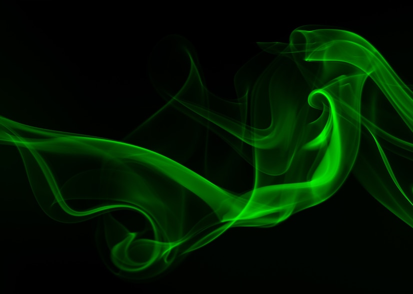 Premium Photo | Green smoke abstract on black background, darkness concept