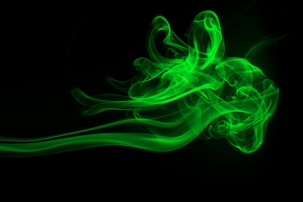 黒の背景 闇の概念に緑の煙抽象 プレミアム写真