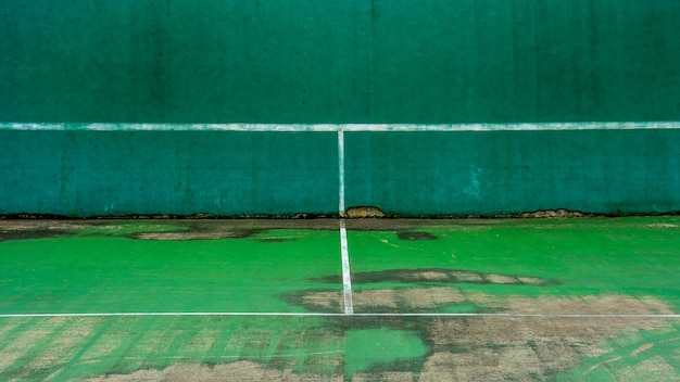 Premium Photo Green Tennis Court And Wall For Practice