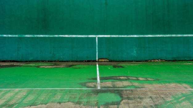 Premium Photo Green Tennis Court And Wall For Practice