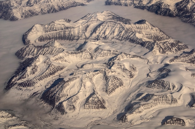 premium-photo-greenland-11000-meters-alt-airplane-view