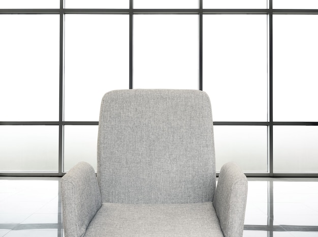 Premium Photo | Grey fabric office chair with office background