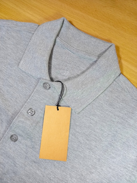 Premium Photo | Grey polo shirt with tag price on