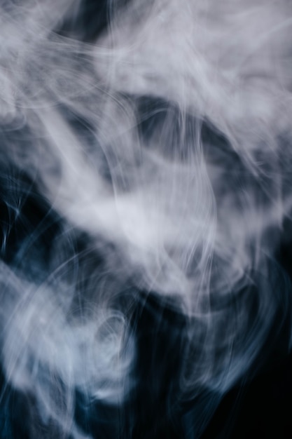 Free Photo | Grey smoke waves on black background