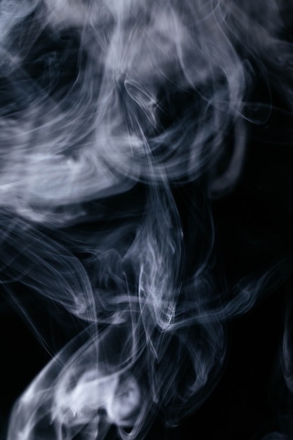 Free Photo | Grey smoke waves on black background