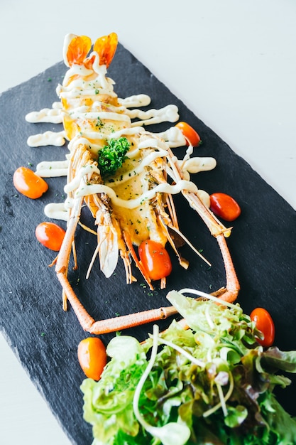 Grilled big prawn or shrimp with sauce Free Photo