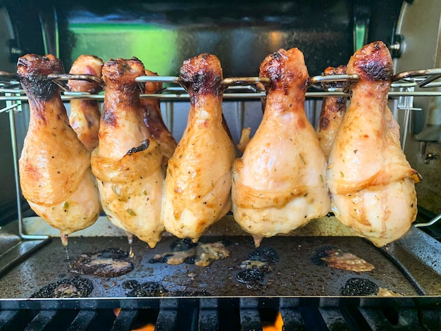 Premium Photo Grilled Chicken Drumsticks Are Cooked In Gas Grill