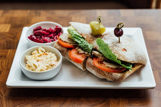 Grilled Chicken Sandwich Made With Homemade Bread Tomato And Lettuce With Beetroot Premium Photo