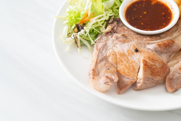 Premium Photo Grilled Pork Chop Steak With Thai Spicy Dipping Sauce