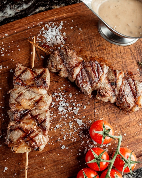 Free Photo | Grilled steak pieces in bamboo skewer garnished with salt ...