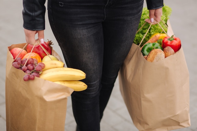 Premium Photo | Groceries from a supermarket in a eco craft package.