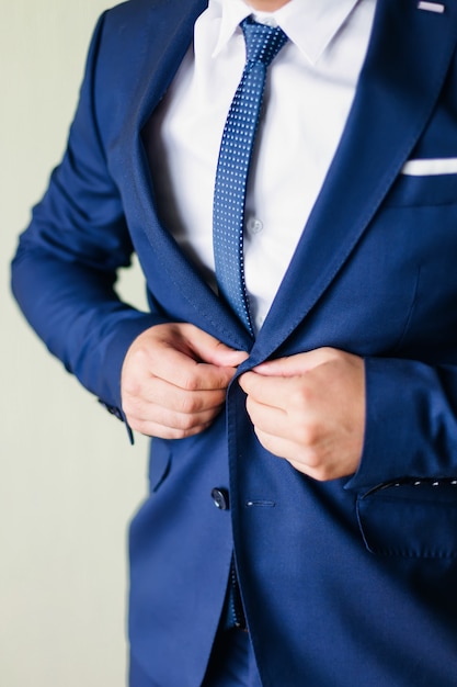 blue coat with white shirt