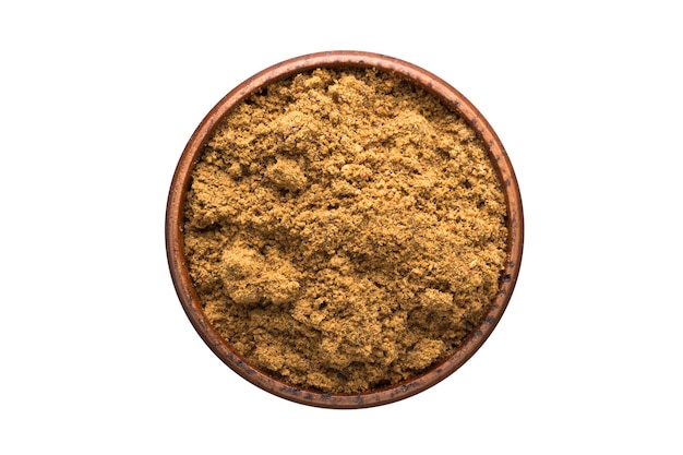 Premium Photo | Ground nutmeg powder spice in wooden bowl, isolated ...