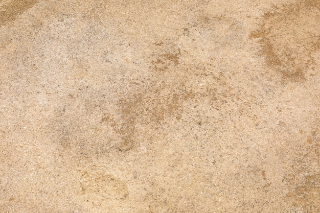 ベージュの砂漠の土 ほこりの多い土地 乾燥した地球および砂の地面テクスチャ背景 プレミアム写真