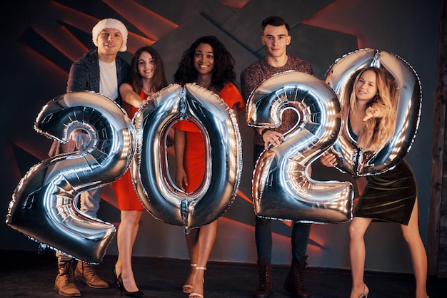 Premium Photo | A group of beautiful young people celebrating the new year.