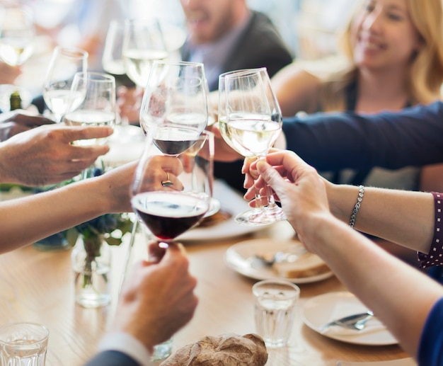 Premium Photo | Group of diverse people are having lunch together