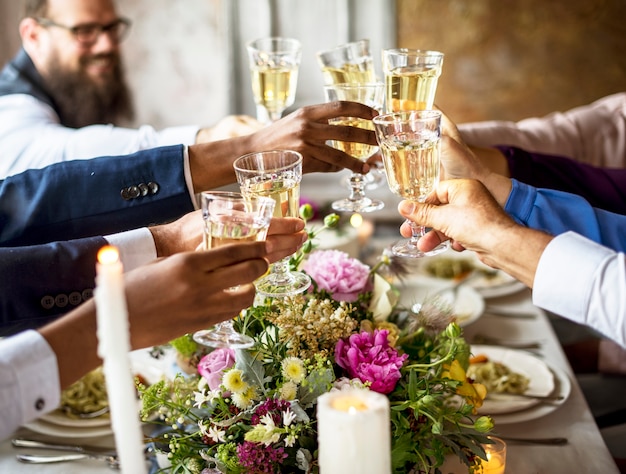 Premium Photo | Group of diverse people clinking wine glasses together ...