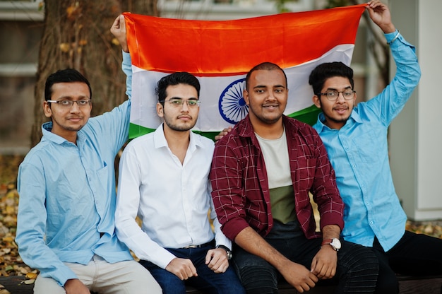 Premium Photo | Group of four south asian indian male with india flag.