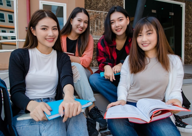 Premium Photo | Group of four young attractive asian girls college ...