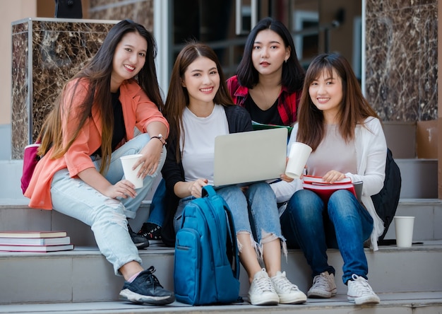 Premium Photo | Group of four young attractive asian girls college ...