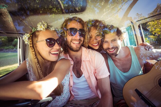 Premium Photo | Group of friends travelling in campervan