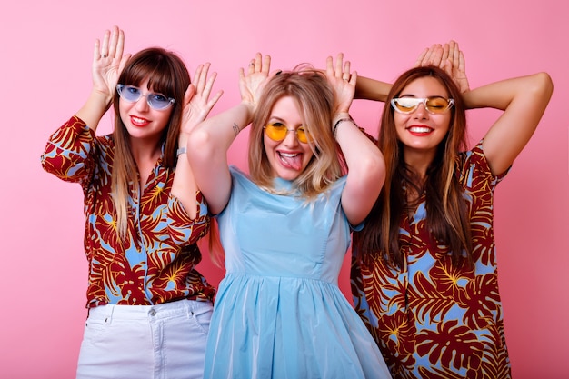 Free Photo | Group of funny hipster girls imitating bunny ears by their ...