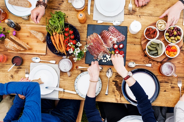 Premium Photo Group Of People Dining Concept