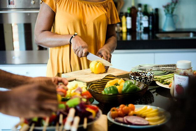 Premium Photo | Group of people preparing barbecue party in the kitchen