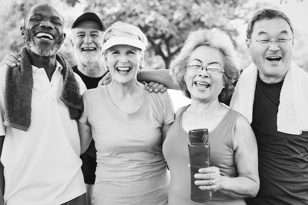 Group photo of senior friends exercising together Free Photo