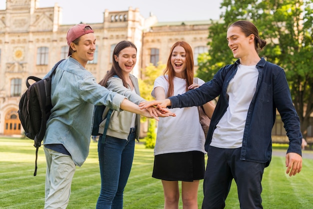 Group of students happy to be back at university Free Photo