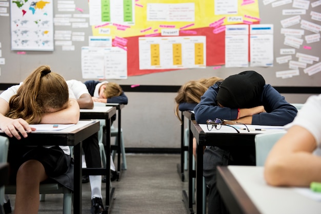 Premium Photo | Group Of Students Sleeping In The Classroom