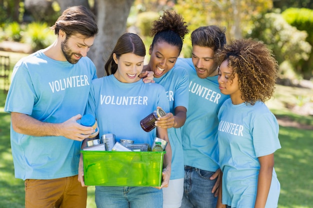 Premium Photo | Group of volunteer holding box