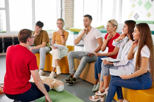 Premium Photo Group Of Young People Practice First Aid Training