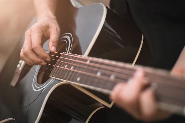 Premium Photo Guitar Player Playing Acoustic Guitar Close Up