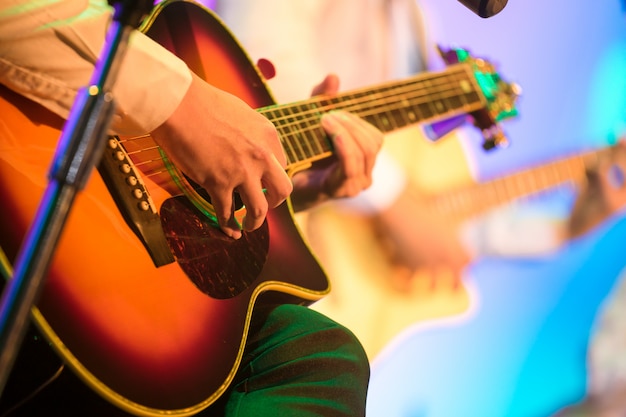 Premium Photo | Guitarist on stage for background