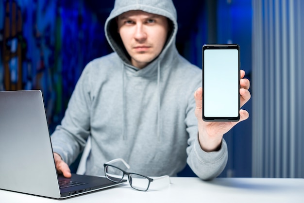 Hacker presenting smartphone template Photo | Free Download