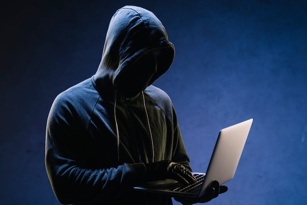 Download Hacker with laptop | Free Photo