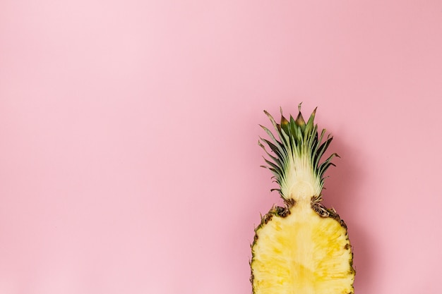 Free Photo Half Slice Of Beautiful Fresh Appetizing Tasty Pineapple On Pink Background Top View Horizontal Copy Space Conceptual