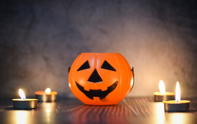 Premium Photo | Halloween background candlelight orange decorated ...