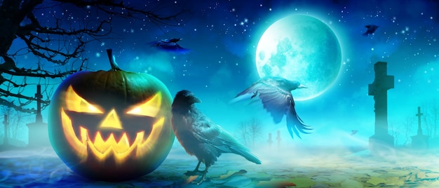 Premium Photo | Halloween background with raven in a spooky night.