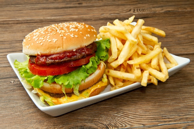 Premium Photo | Hamburger with potatoes