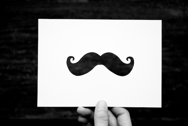 Hand Hold Mustache Paper Carving Free Photo