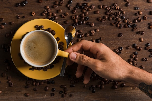 Download Free Photo Yellow Cup Of Coffee And Plate With Sugar Cube PSD Mockup Templates