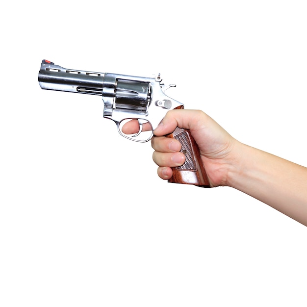 Premium Photo | Hand holding a gun