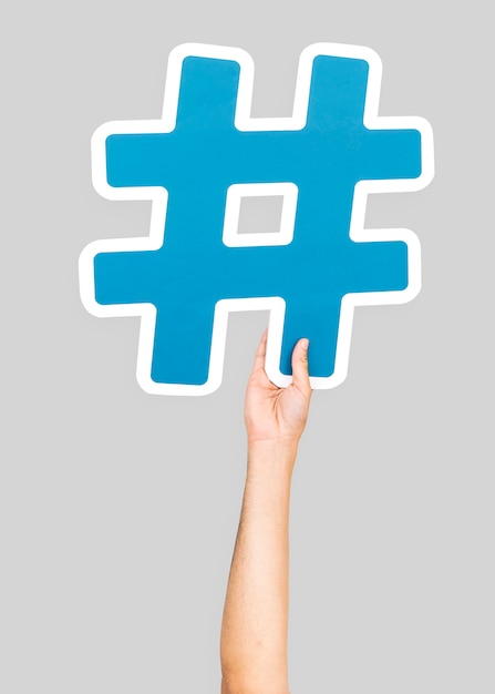  Hand  holding hashtag  symbol Photo Free Download